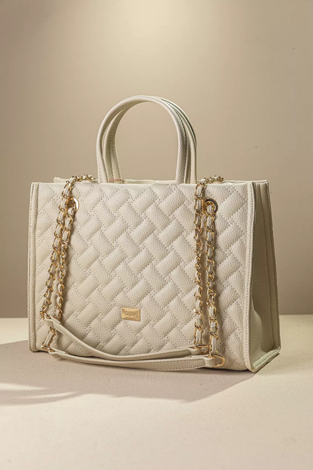 Καπιτονέ τσάντα με άποψη