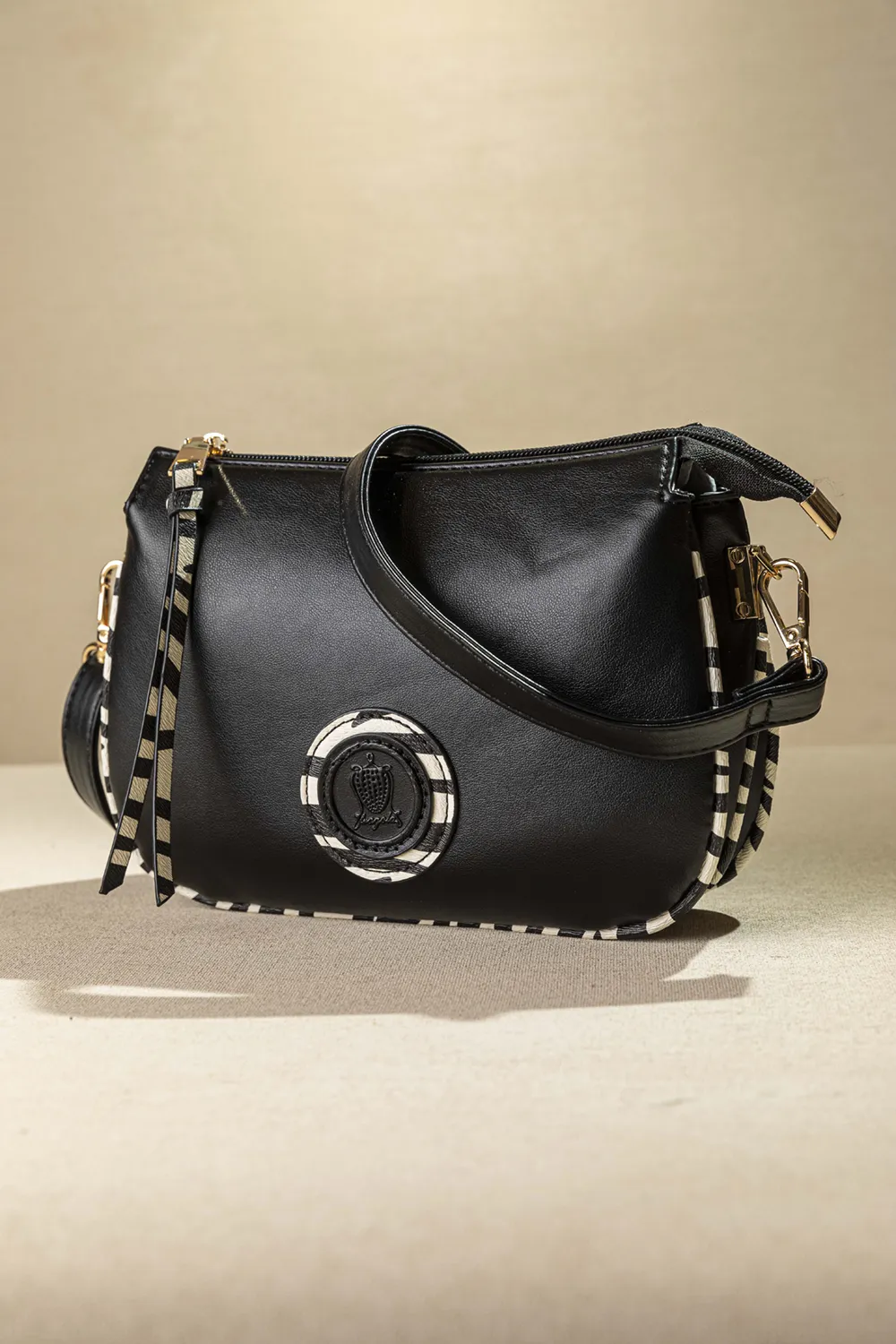 Χιαστί τρίχωρη τσάντα με zebra print φινιρίσματα