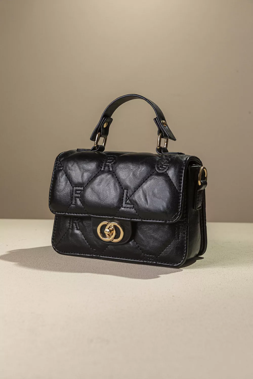 Καπιτονέ τριθέσια τσάντα χειρός