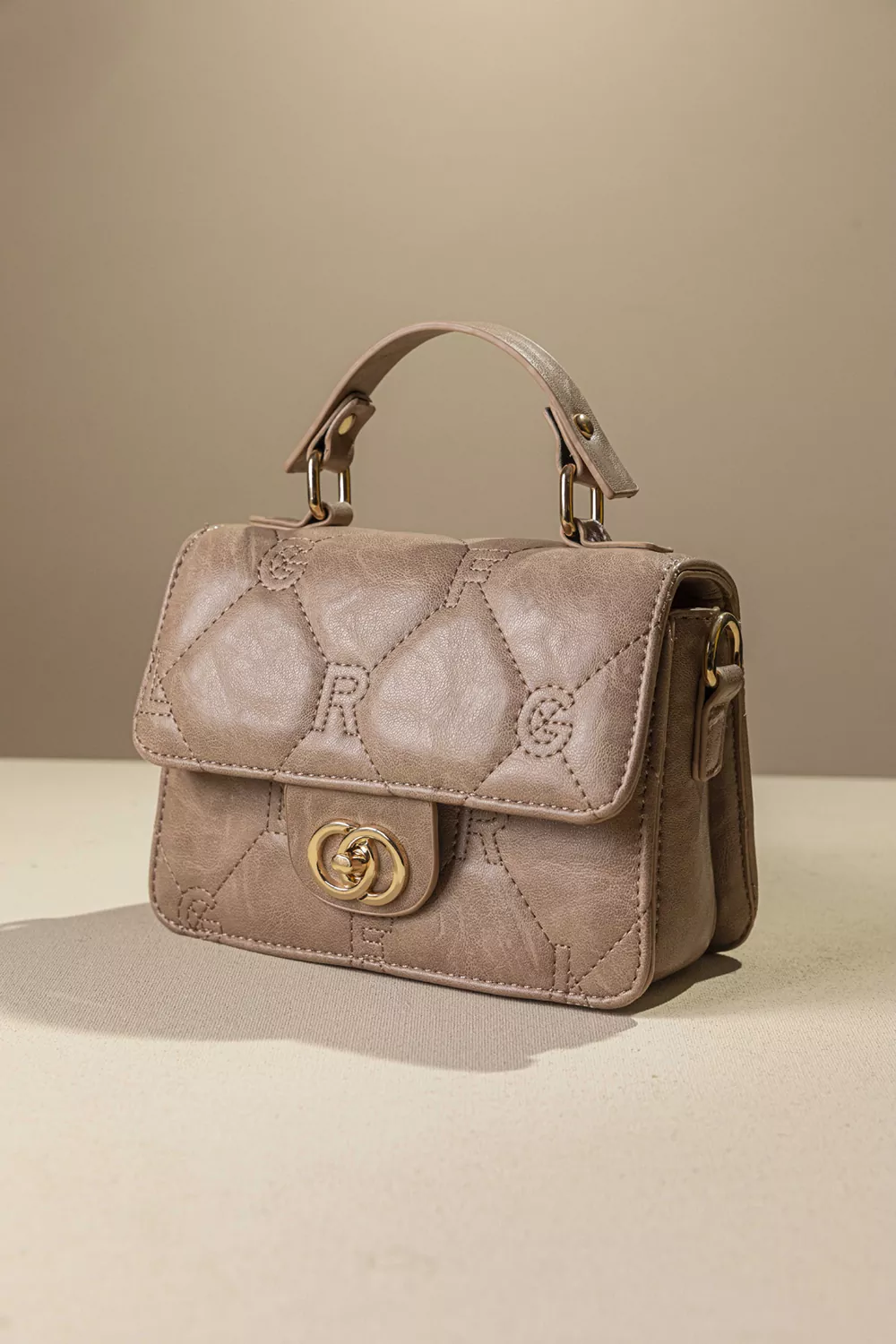 Καπιτονέ τριθέσια τσάντα χειρός