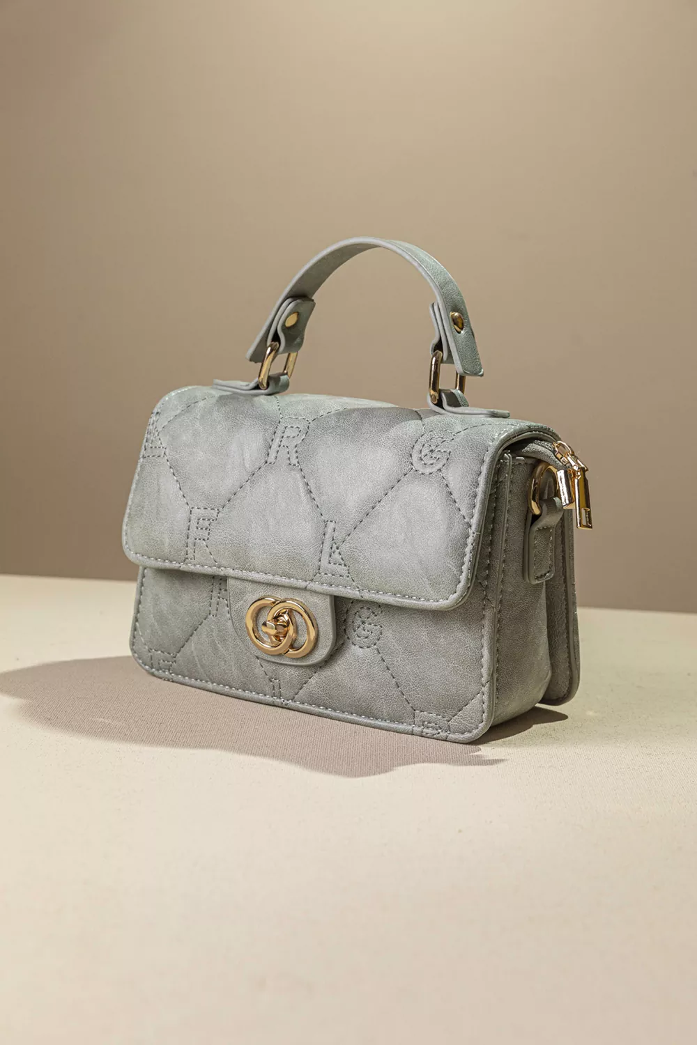 Καπιτονέ τριθέσια τσάντα χειρός