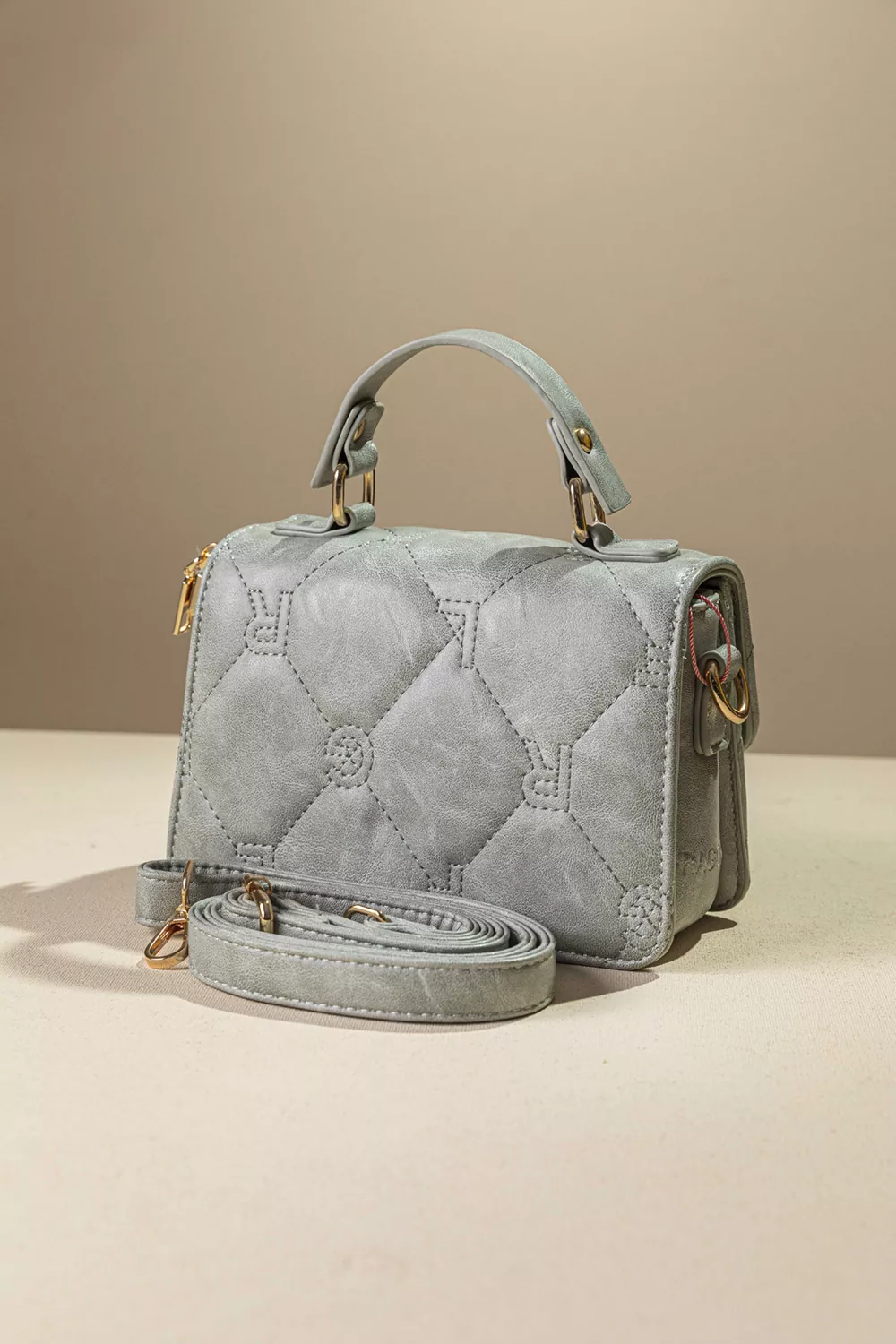 Καπιτονέ τριθέσια τσάντα χειρός