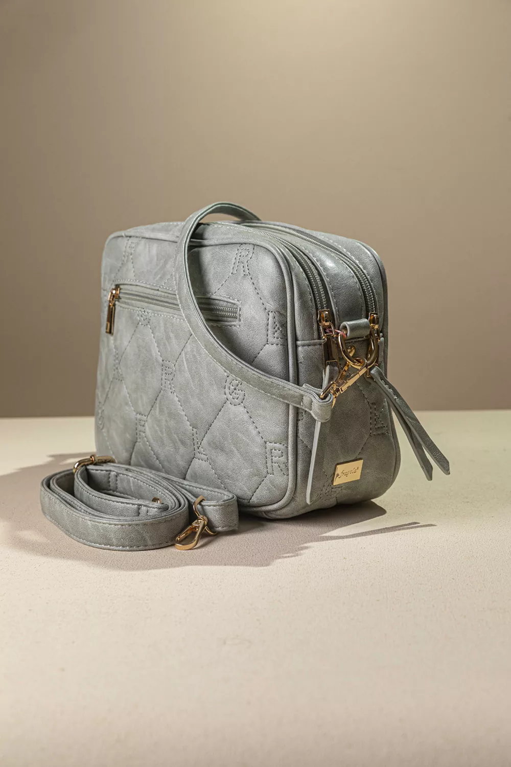 Καπιτονέ τριθέσια τσάντα χειρός