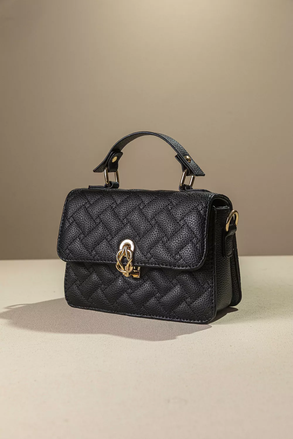 Καπιτονέ τριθέσια τσάντα χειρός