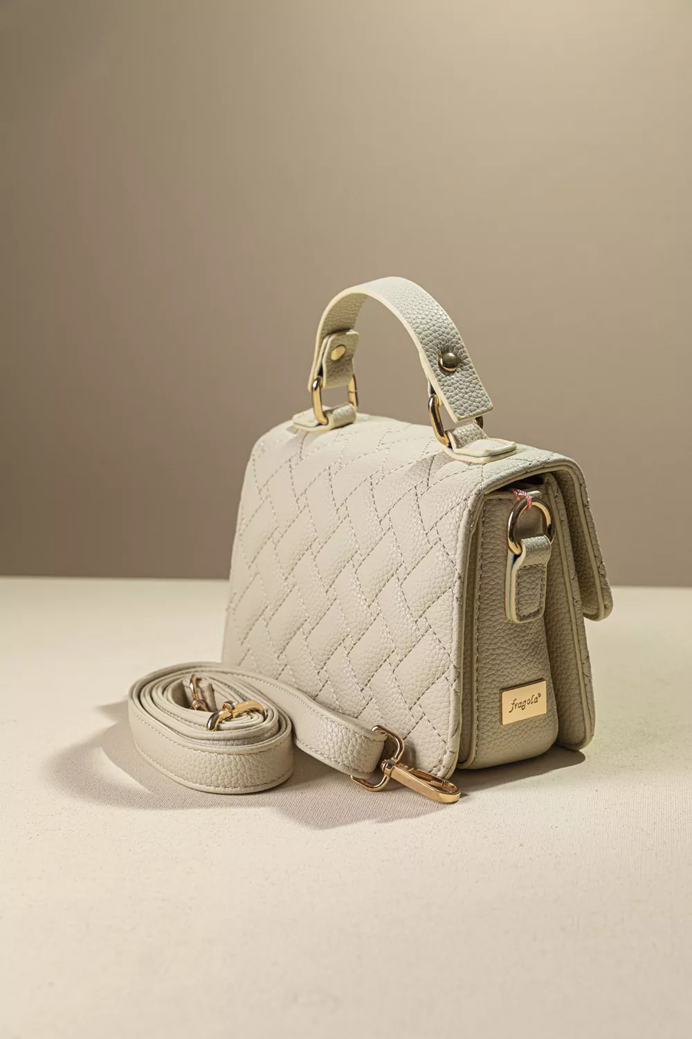 Καπιτονέ τριθέσια τσάντα χειρός