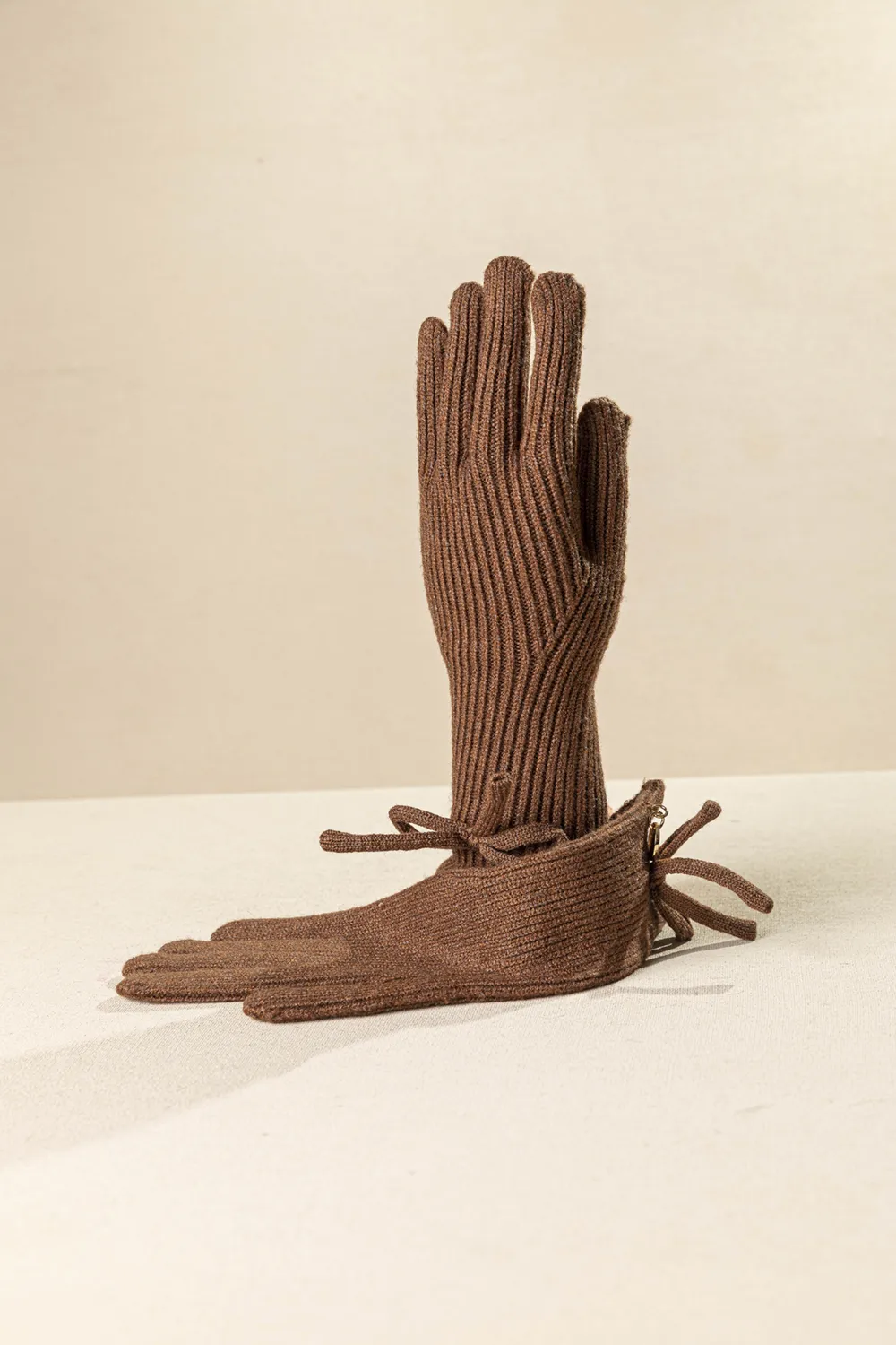 Πλεκτό γυναικείο γάντι με διακριτικό φιόγκο