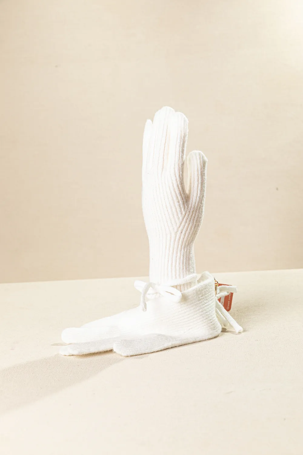 Πλεκτό γυναικείο γάντι με διακριτικό φιόγκο