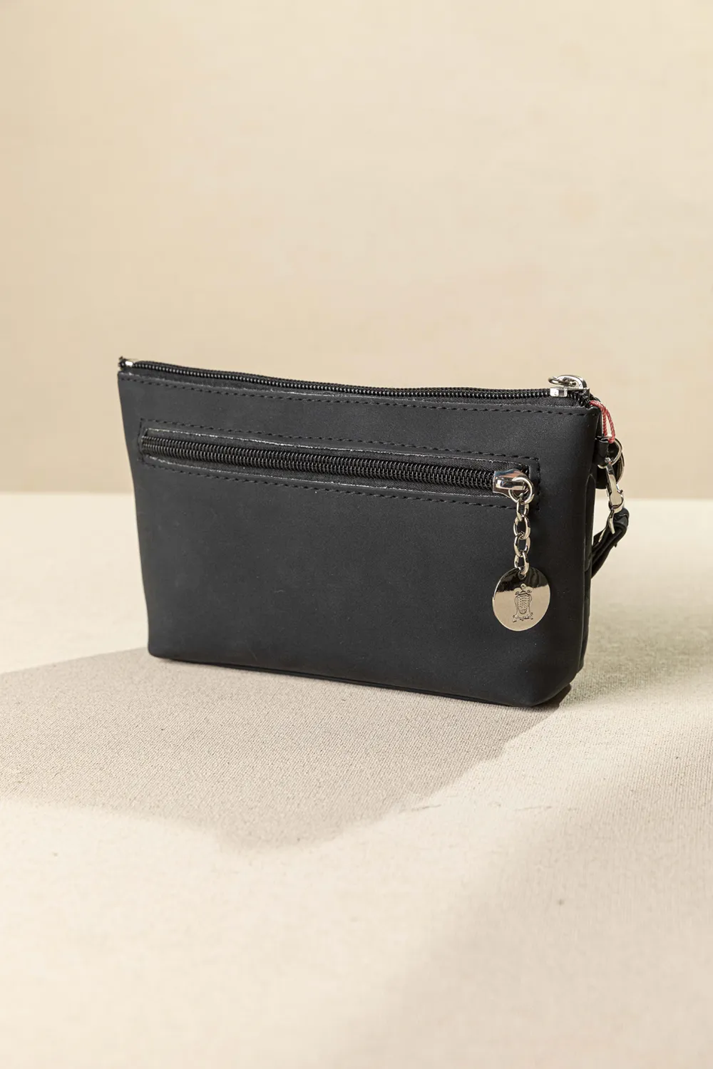 Πορτοφόλι – Νεσεσέρ χειρός με αποσπώμενη χειρολαβή Πορτοφόλι – Νεσεσέρ χειρός με αποσπώμενη χειρολαβή