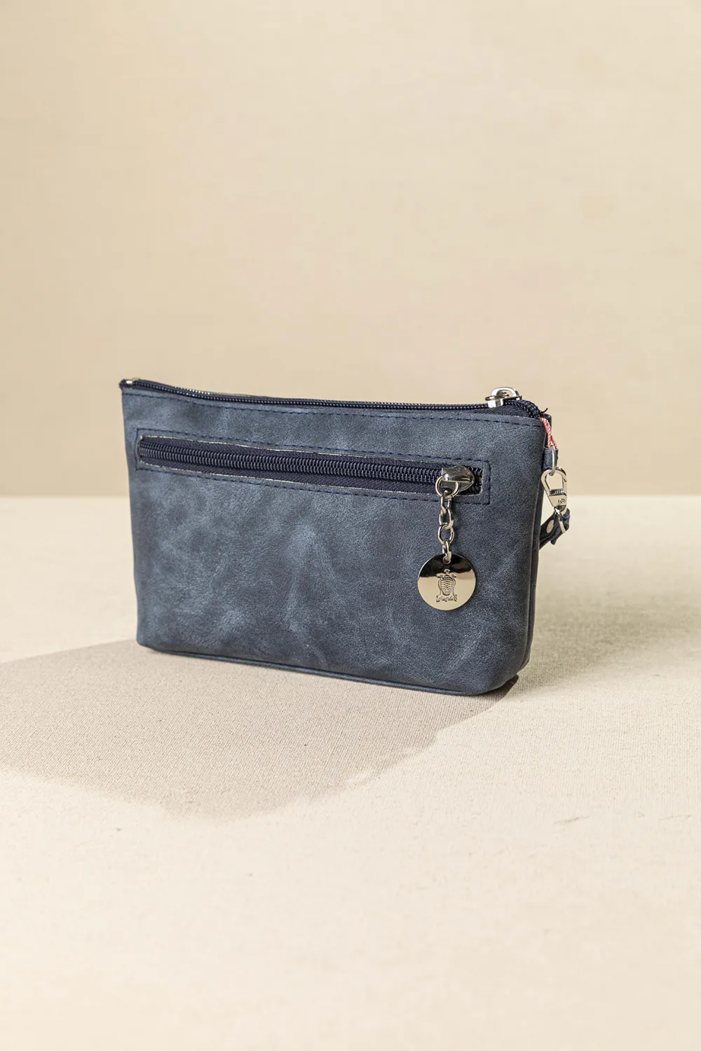 Πορτοφόλι – Νεσεσέρ χειρός με αποσπώμενη χειρολαβή Πορτοφόλι – Νεσεσέρ χειρός με αποσπώμενη χειρολαβή