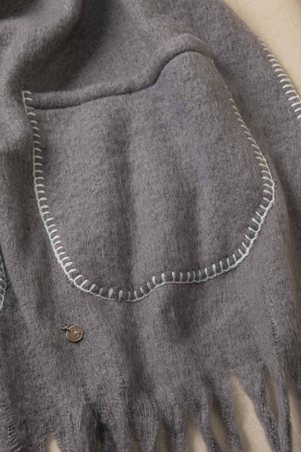 Κουβέρτα-πασμίνα με τσέπες