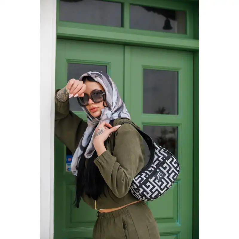 Ασπρόμαυρη τσάντα χειρός Matilde Ασπρόμαυρη τσάντα χειρός Matilde