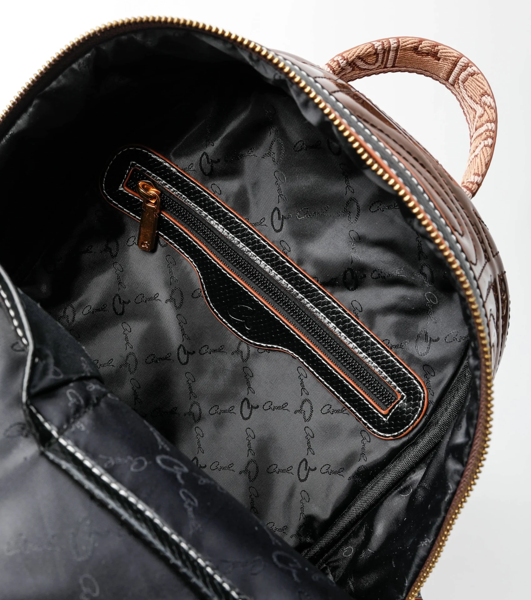 Axel Σακίδιο με ανάγλυφο μονόγραμμα Reese 1023-0470 Μπρονζέ