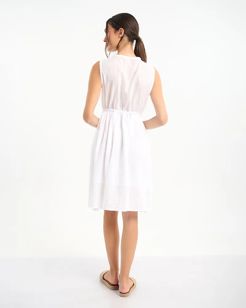 ΦΟΡΕΜΑ ΣΕ ΛΕΥΚΟ ΧΡΩΜΑ ΜΕ ΛΟΥΛΟΥΔΙΑ ΣΤΟ ΤΕΛΟΣ ONE SIZE (100% COTTON)