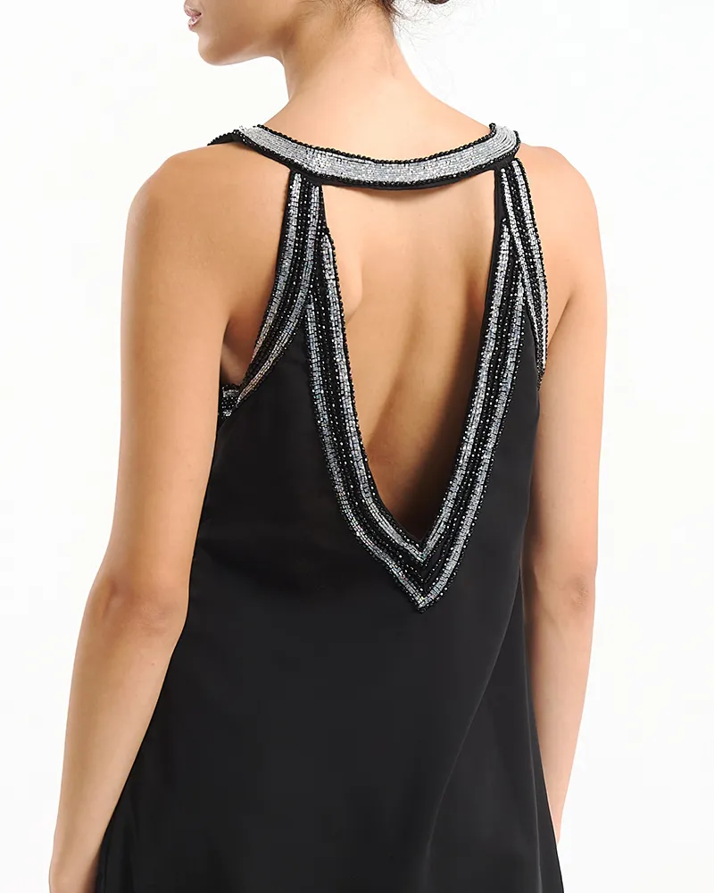 ΦΟΡΕΜΑ ΜΑΚΡΥ ΑΜΑΝΙΚΟ ΜΕ ΑΝΟΙΧΤΗ ΠΛΑΤΗ ΣΕ ΜΑΥΡΟ ΧΡΩΜΑ ΜΕ ΑΣΗΜΙ ΛΕΠΤΟΜΕΡΕΙΕΣ ONE SIZE (100% VISCOSE)