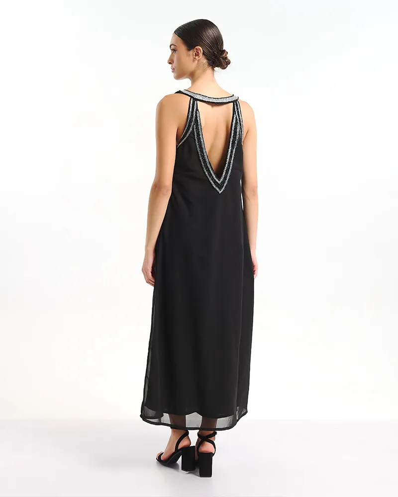 ΦΟΡΕΜΑ ΜΑΚΡΥ ΑΜΑΝΙΚΟ ΜΕ ΑΝΟΙΧΤΗ ΠΛΑΤΗ ΣΕ ΜΑΥΡΟ ΧΡΩΜΑ ΜΕ ΑΣΗΜΙ ΛΕΠΤΟΜΕΡΕΙΕΣ ONE SIZE (100% VISCOSE)