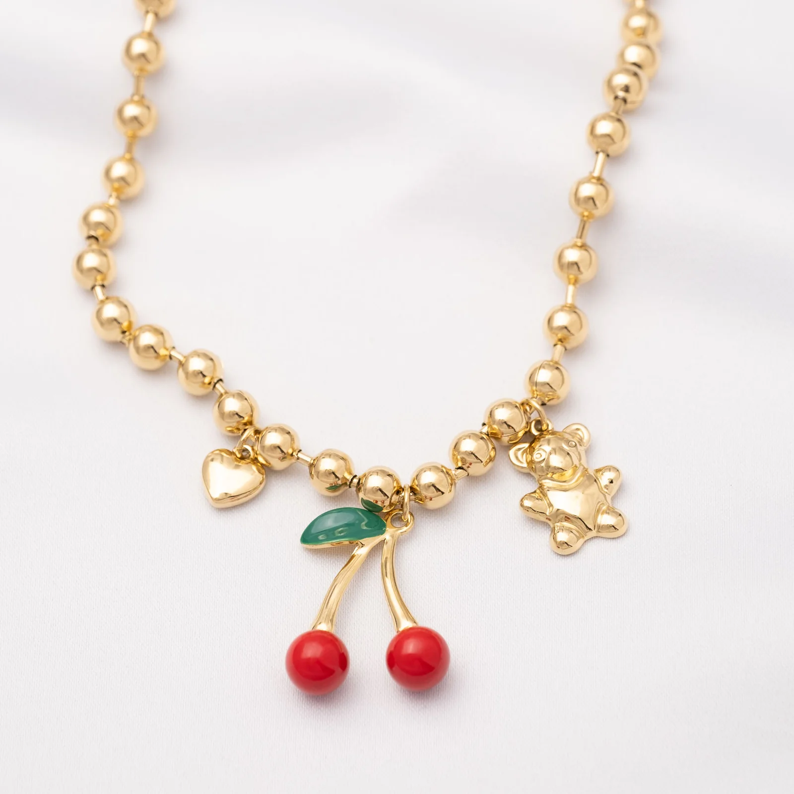 Sequoia Γυναικείο Ατσάλινο Χρυσό Βραχιόλι με Κεράσι, Καρδιά & Αρκουδάκι BR-0002G Sequoia Γυναικείο Ατσάλινο Χρυσό Βραχιόλι με Κεράσι, Καρδιά & Αρκουδάκι BR-0002G